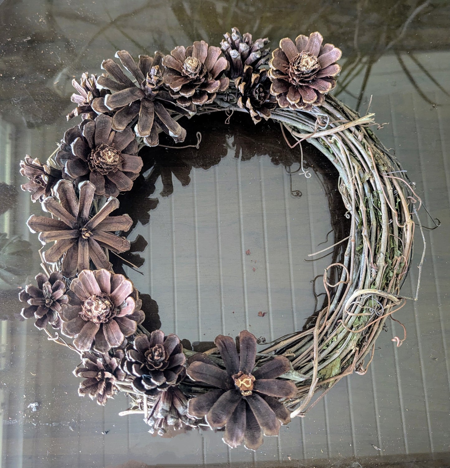 Custom wreath with spray painted flower pinecones