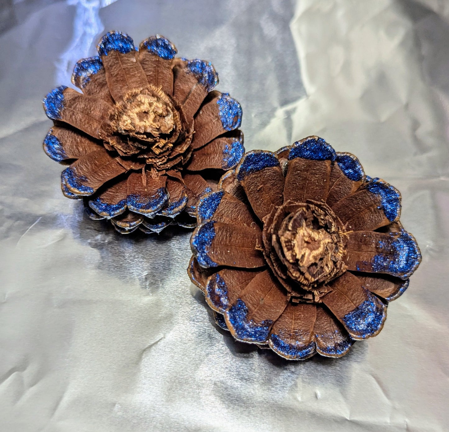 Custom wreath with glitter painted flower pinecones