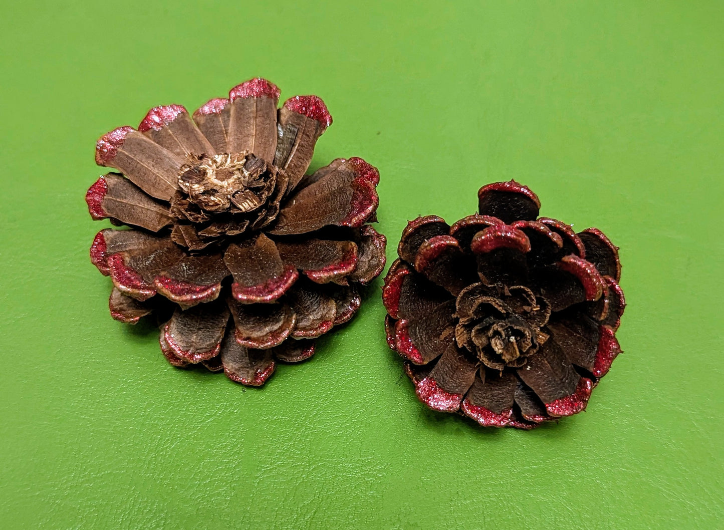 Custom wreath with glitter painted flower pinecones