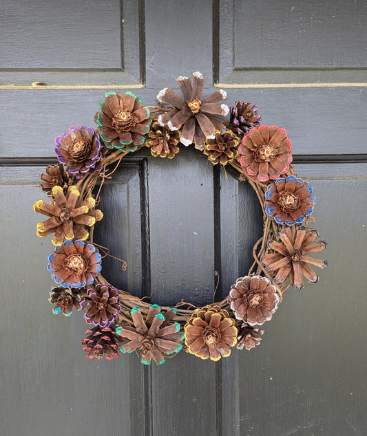 Custom wreath with glitter painted flower pinecones