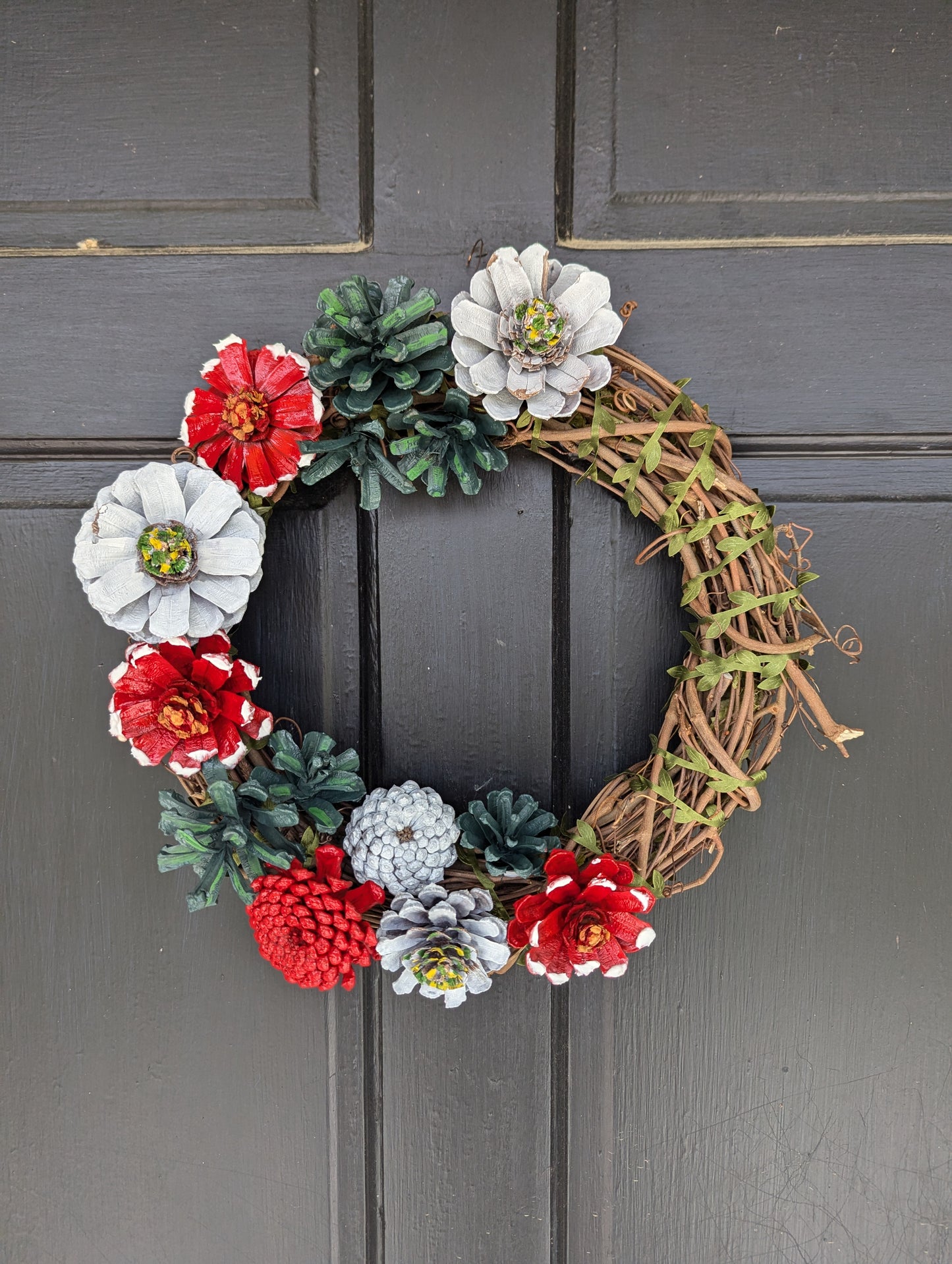 Custom wreath with spray painted flower pinecones